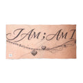 Beach Towel — “I AM; AM I” Script Tattoo Design with Heart Charm